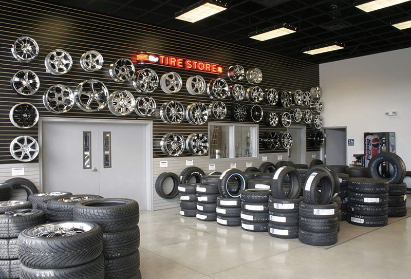 tire store showroom displaying tire and wheels