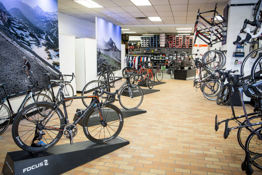 bike shops online, inside bike shop with numerous bikes