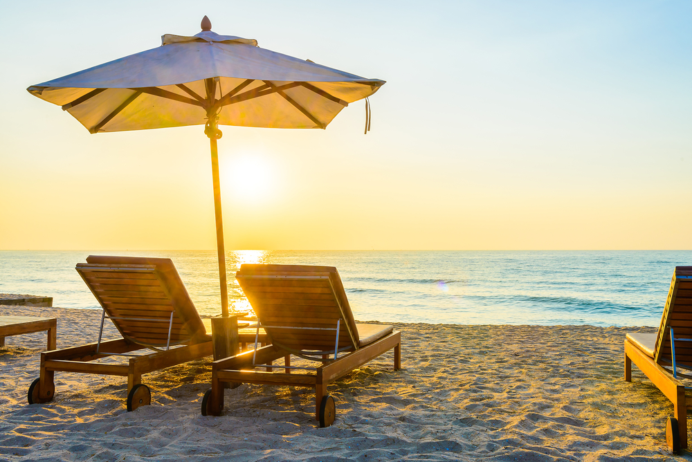 grand strand beaches, lounge chairs and umbrella on ocean beach